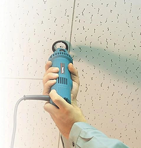 Makita 1/8" drywall guide tip bit in use cutting drywall on ceiling during installation
