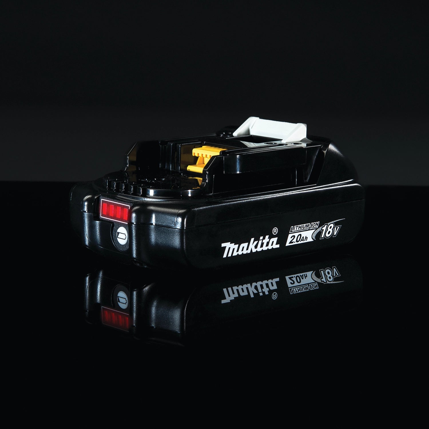Makita 2.0Ah battery installed on power tool in active use

