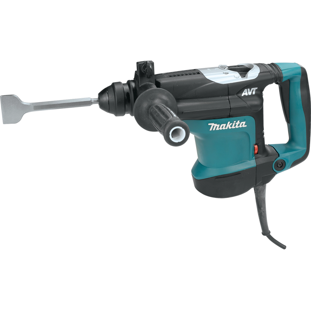 Makita 2" x 8.5" scaling chisel SDS+ inserted into rotary hammer during operation
