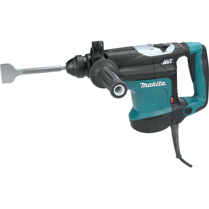 Makita 2" x 8.5" scaling chisel SDS+ inserted into rotary hammer during operation

