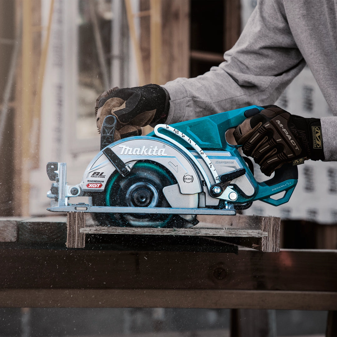 makita right-hand saw in use on framing project cutting structural lumber
