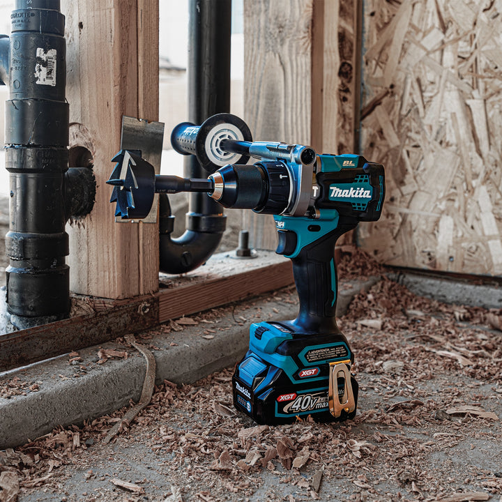makita 40v max xgt tools in use on job sanding and fastening wood framing
