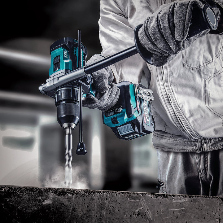 makita 40v xgt battery tools in use outdoors on rough construction job
