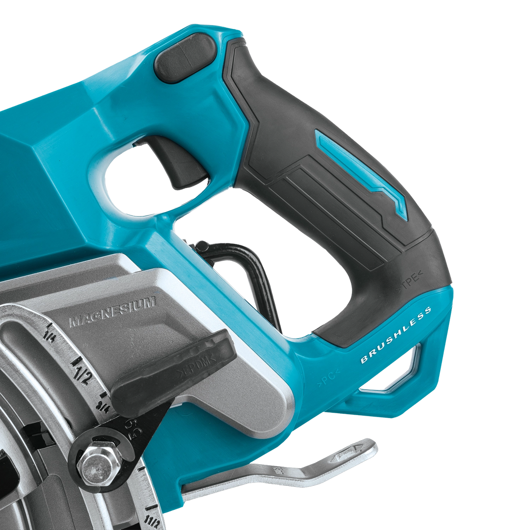 close-up of makita 40v saw handle showing rubberized grip and control placement
