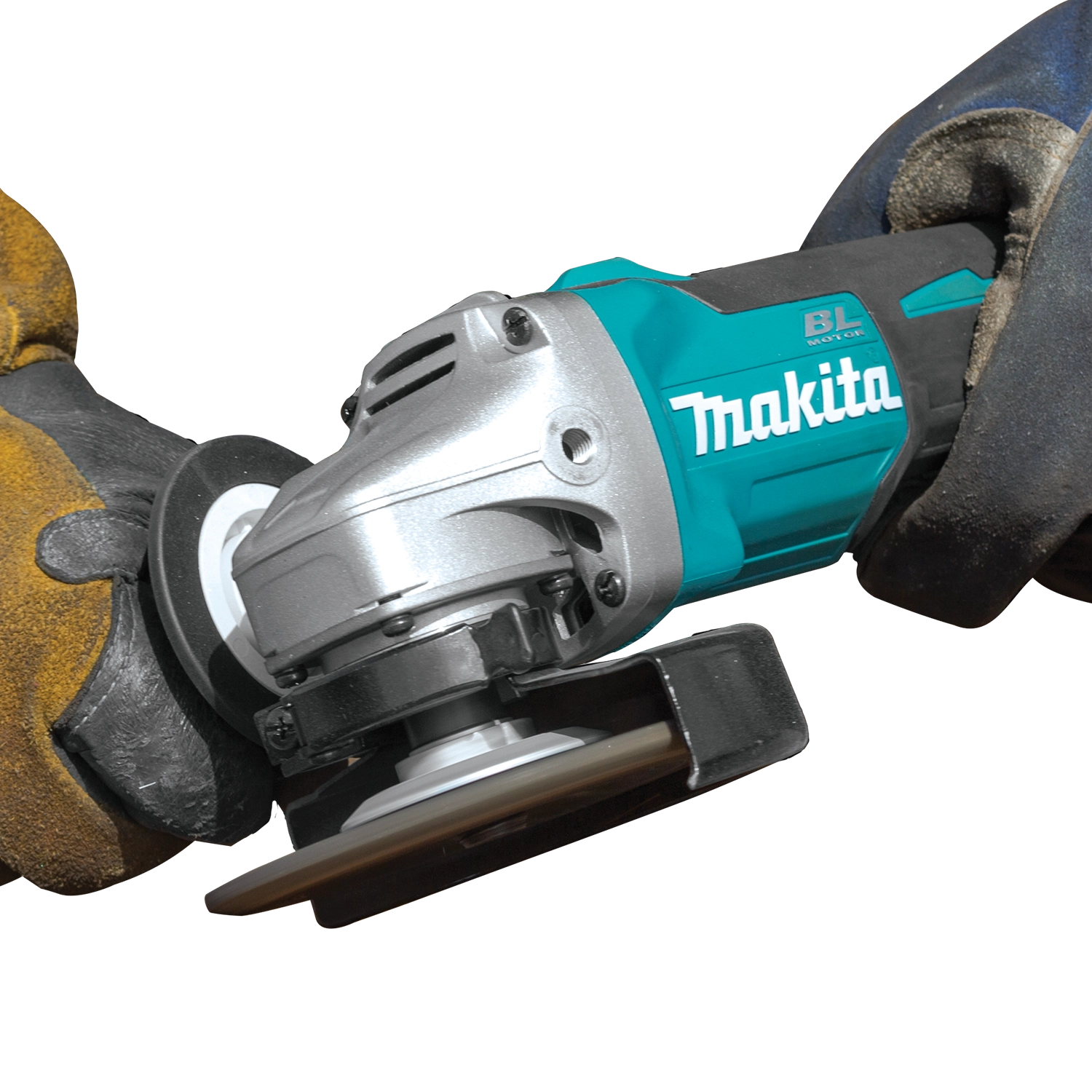 Makita cordless grinder close-up highlighting motor and disc assembly

