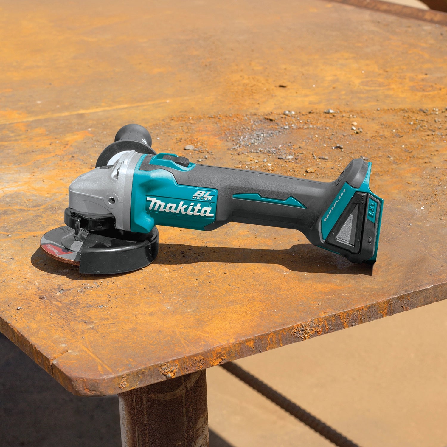 Makita grinder actively being used at a construction site
