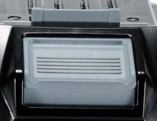 Close-up of clip and locking mechanism on Makita XGT battery
