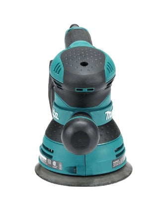 front view of makita 5 inch random orbit sander showing sanding pad and ergonomic grip
