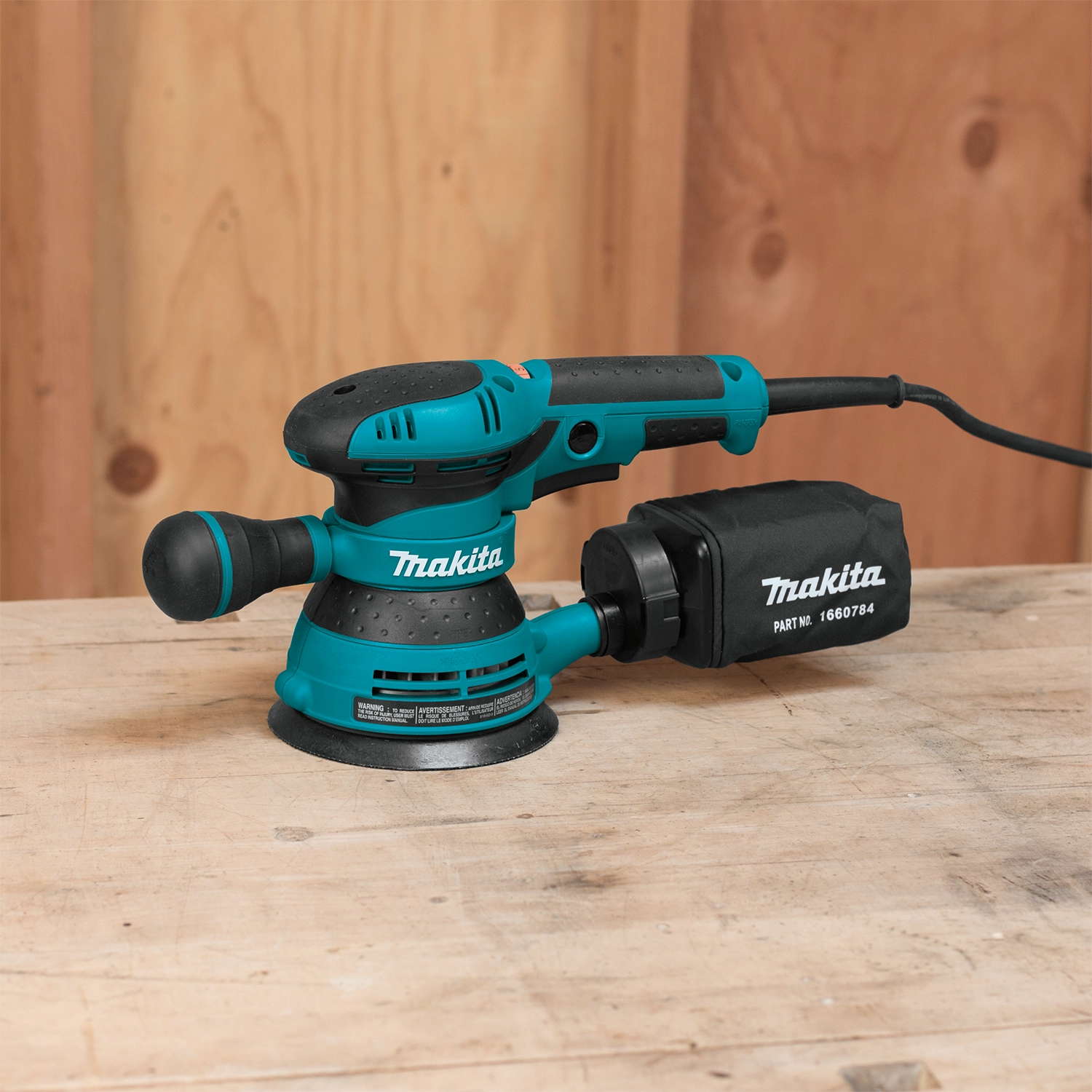 makita 5 inch orbit sander in use during woodworking project on jobsite

