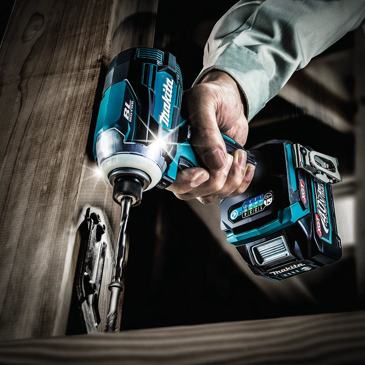makita gdt01 impact driver being used on job site fastening structural supports
