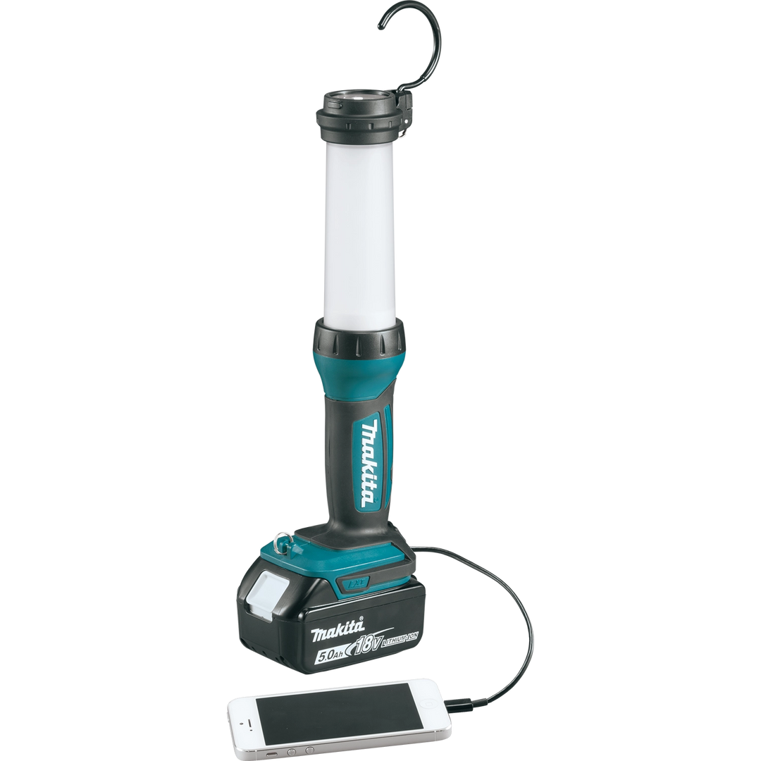 makita led lantern flashlight plugged into phone via usb for charging

