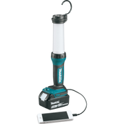 makita led lantern flashlight plugged into phone via usb for charging
