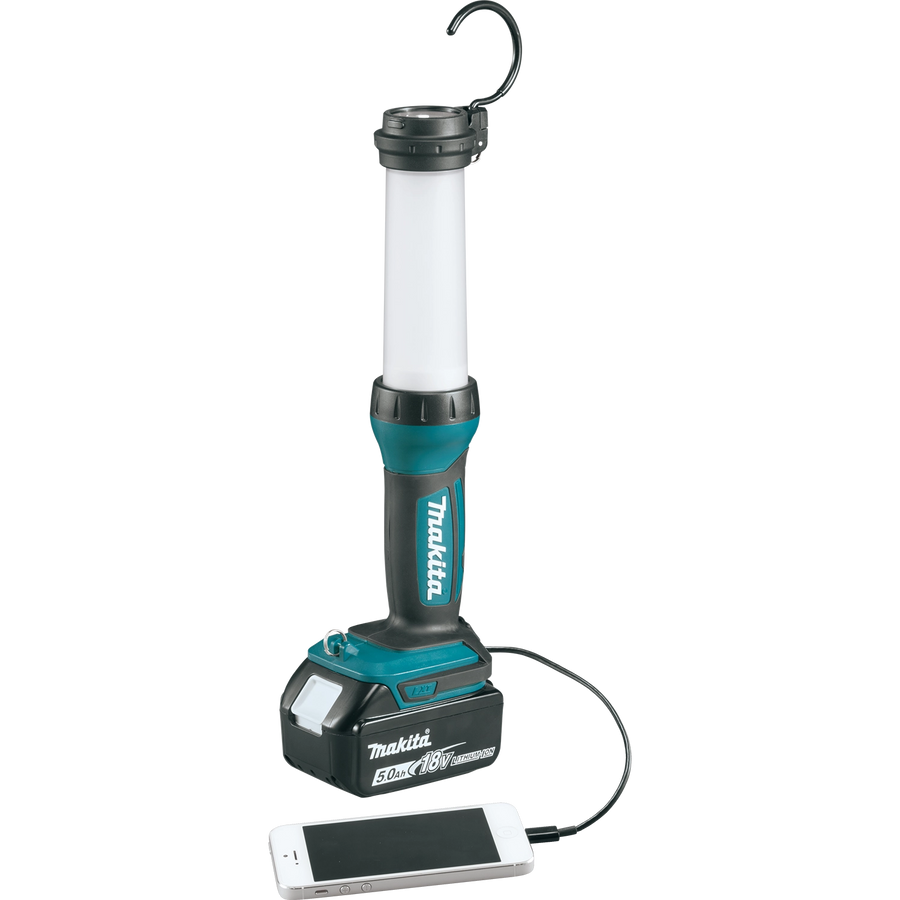 makita led lantern flashlight plugged into phone via usb for charging
