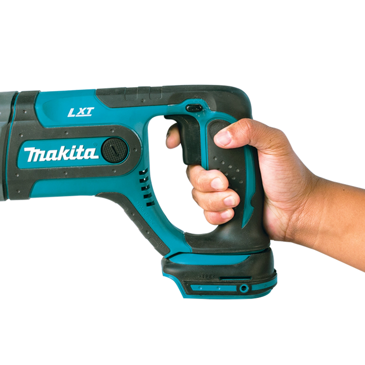 Close-up of Makita rotary hammer trigger and grip detail for control emphasis

