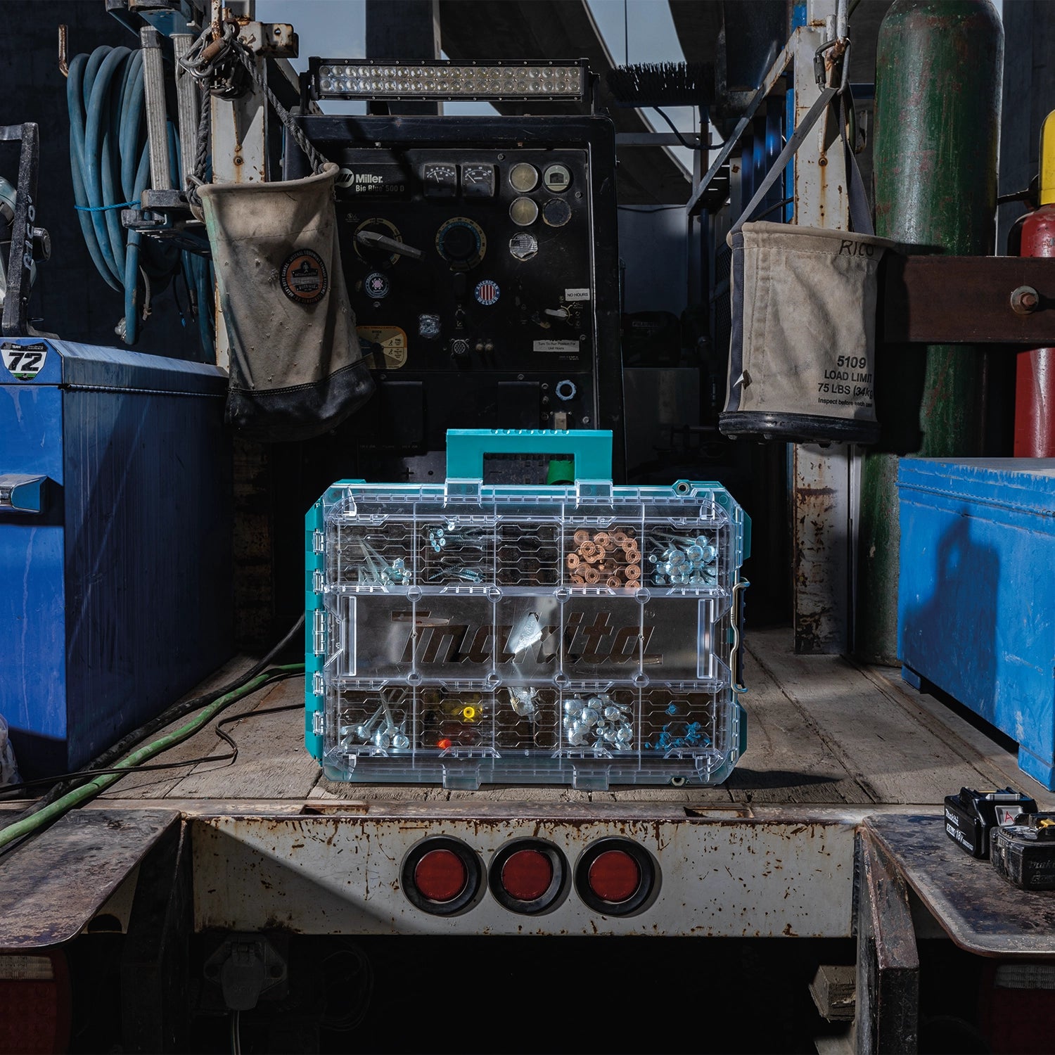 Makita T-90043 organizer standing upright on truck bed
