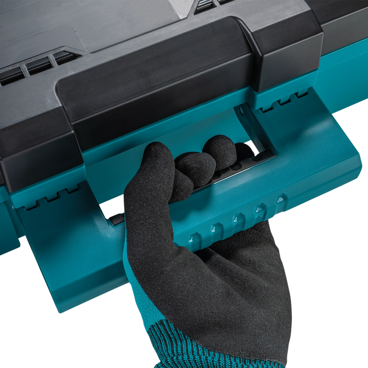 Close-up of Makita T-90037 comfort grip handle in use with gloves
