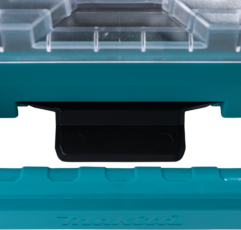 Close-up of the hidden security tracker slot and metal-reinforced locking point on the Makita T-90059 Organizer

