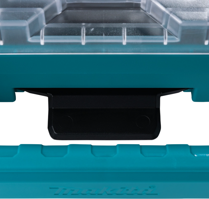 Close-up of the hidden security tracker slot and metal-reinforced locking point on the Makita T-90059 Organizer

