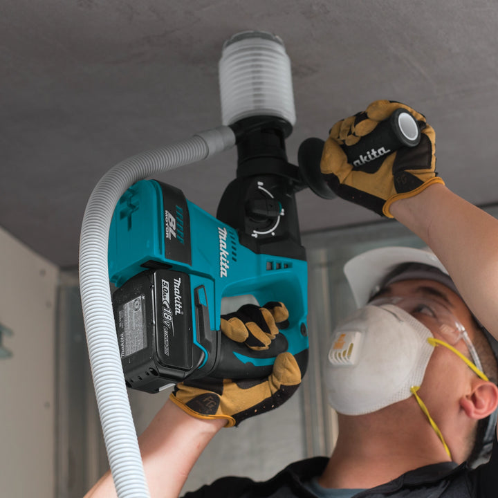 Makita tool being used overhead for ceiling application or installation
