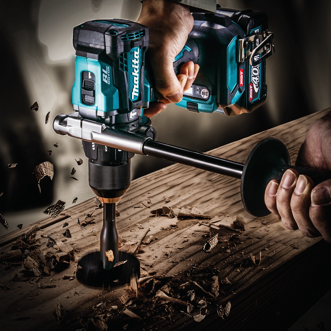 makita job site combo kit tools sitting near toolbox on rugged job site surface
