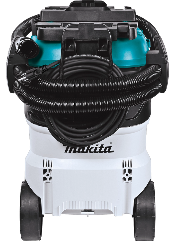 Back of Makita VC4210L with fully wrapped hose and power cord storage on large wheels
