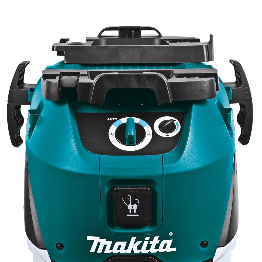 Close-up of Makita VC4210L control panel showing power dial and tool-activated outlet

