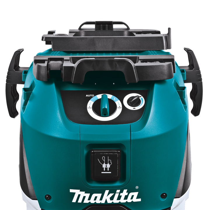 Close-up of Makita VC4210L control panel showing power dial and tool-activated outlet

