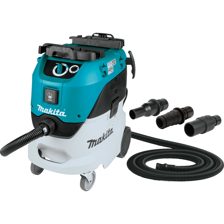 Makita VC4210L with anti-static hose and tool adapters displayed next to unit
