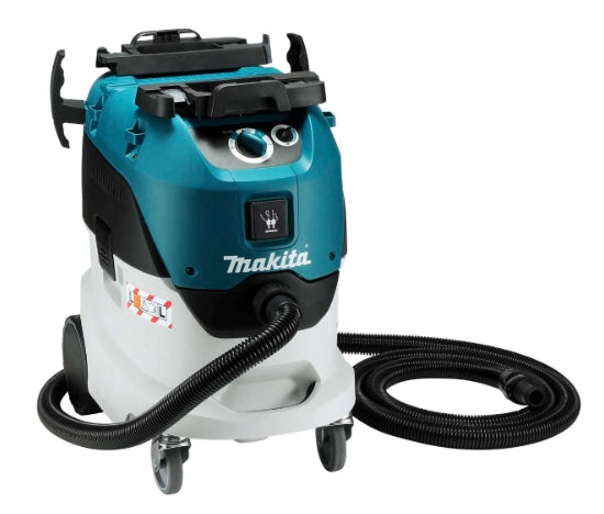 Front angled view of Makita VC4210L dust extractor with attached hose and labeled controls

