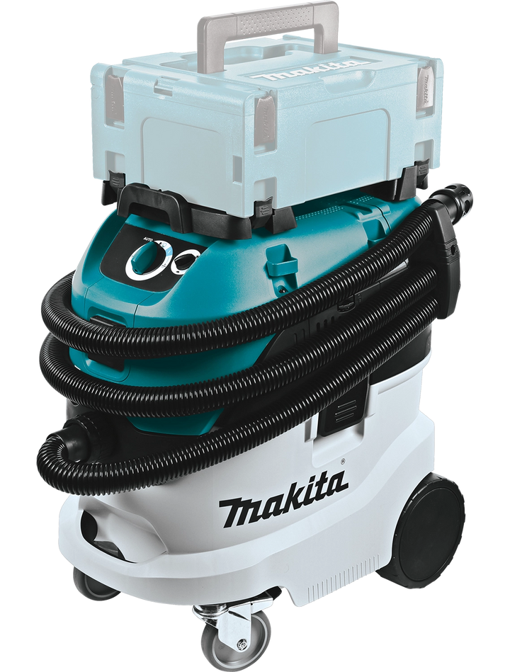 Makita VC4210L vacuum with Makita tool case stacked on top for storage compatibility
