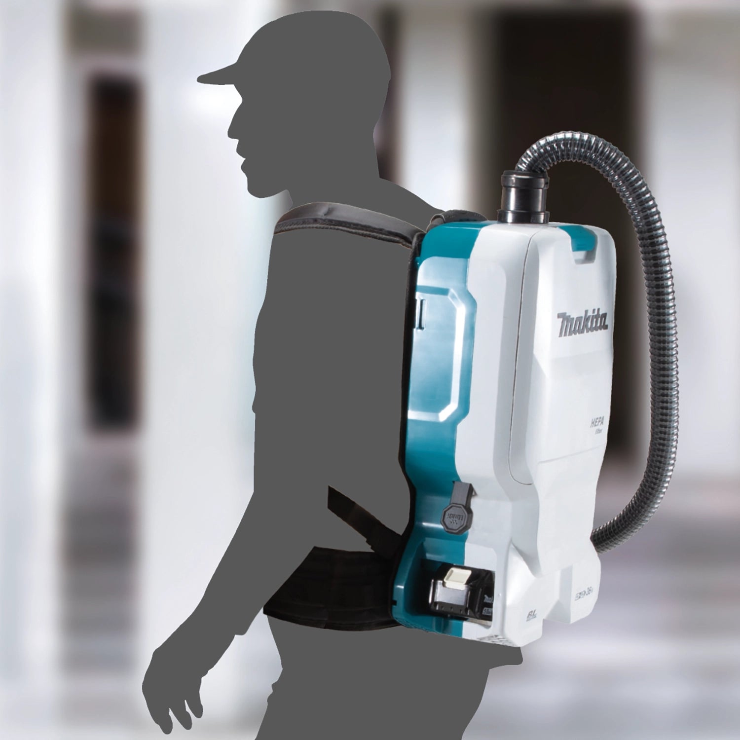 diagram printed on rear of makita vacuum showing airflow system and filter placement
