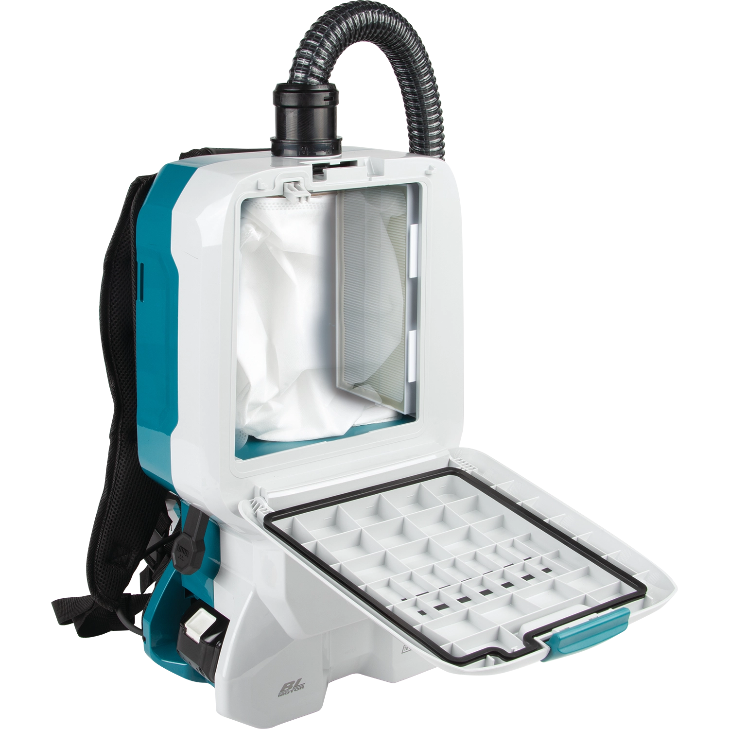 rear compartment of makita xcv17pg vacuum open showing battery ports and filter housing
