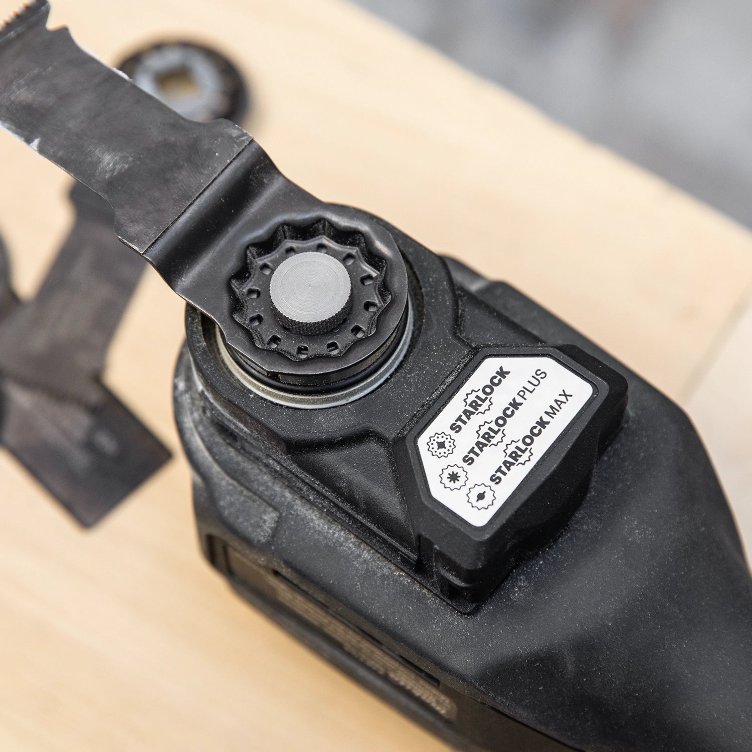 Detailed view of Starlock blade mount on Makita XMT04ZB multi-tool
