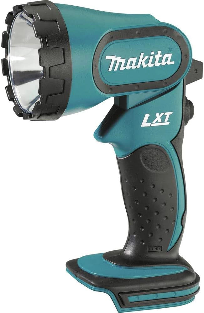 Front view of Makita 18V LXT combo kit tools and charger arranged for full visibility
