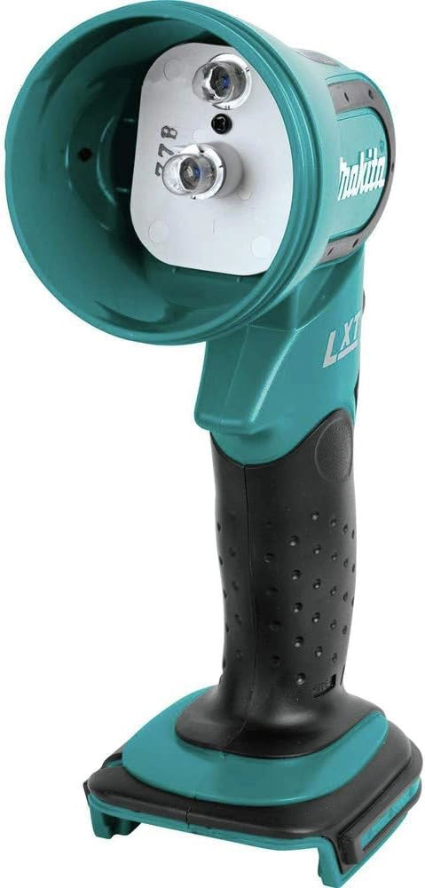 Makita impact driver driving screws into wood framing on active jobsite

