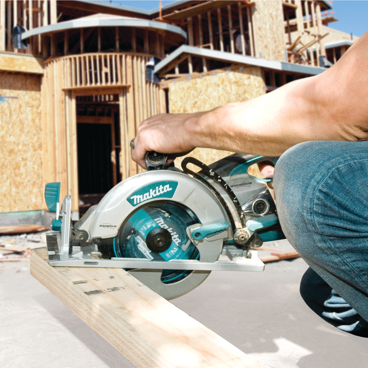 Makita Hypoid Saw actively cutting wood material
