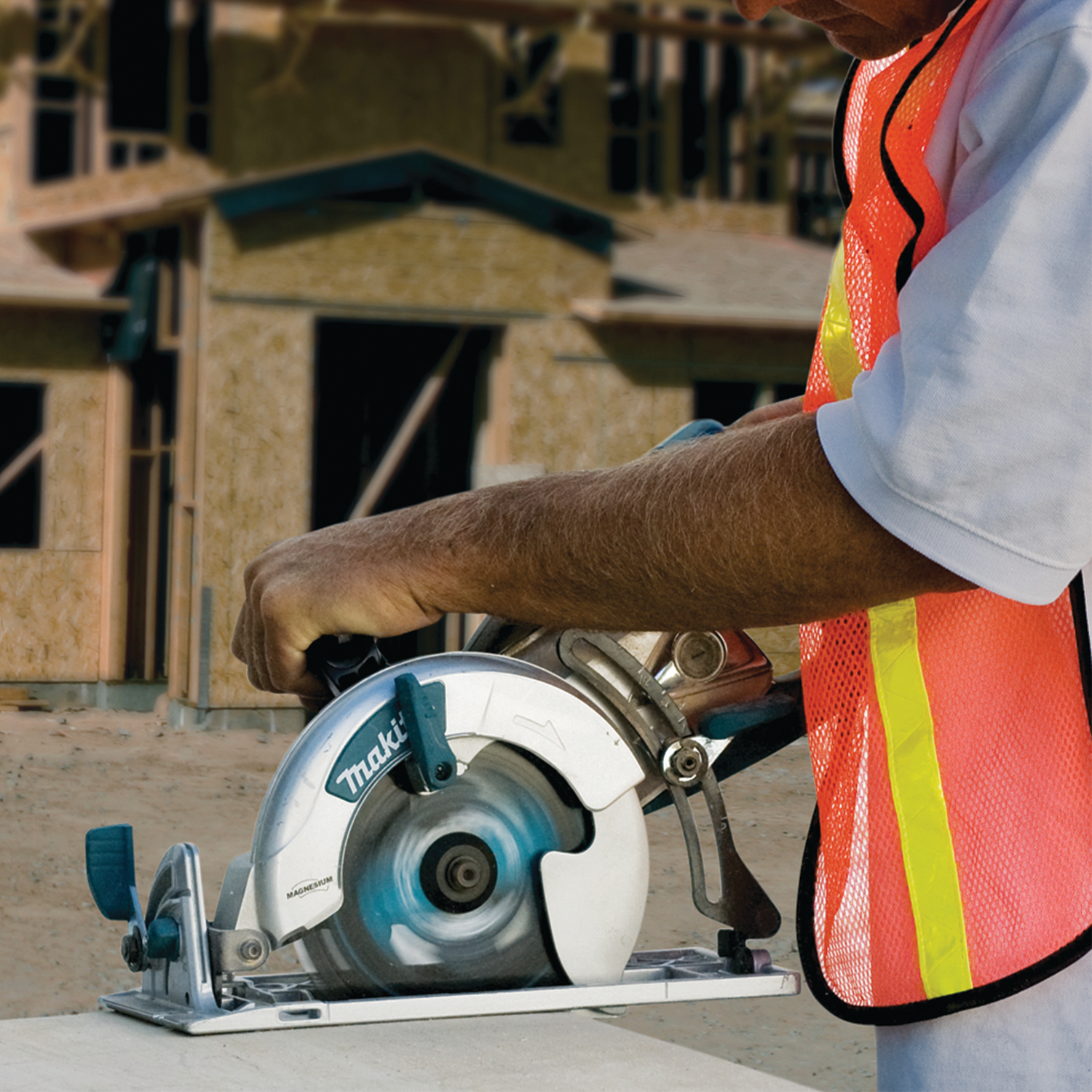 Side angle of Makita Hypoid Saw on job site showing blade depth
