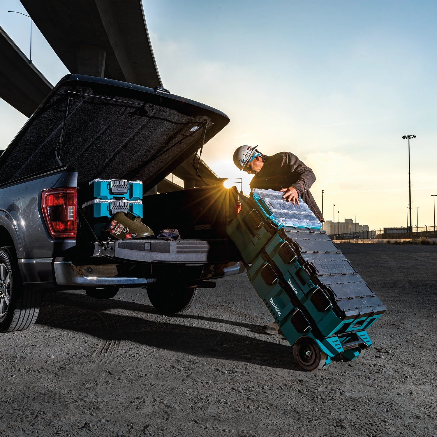 MAKTRAK system being loaded into truck bed for jobsite transport
