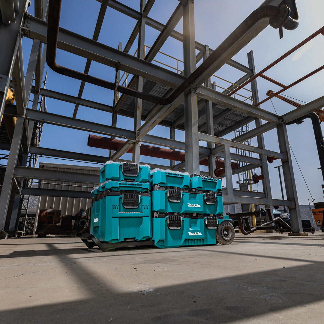 Multiple MAKTRAK organizers stacked and secured on jobsite
