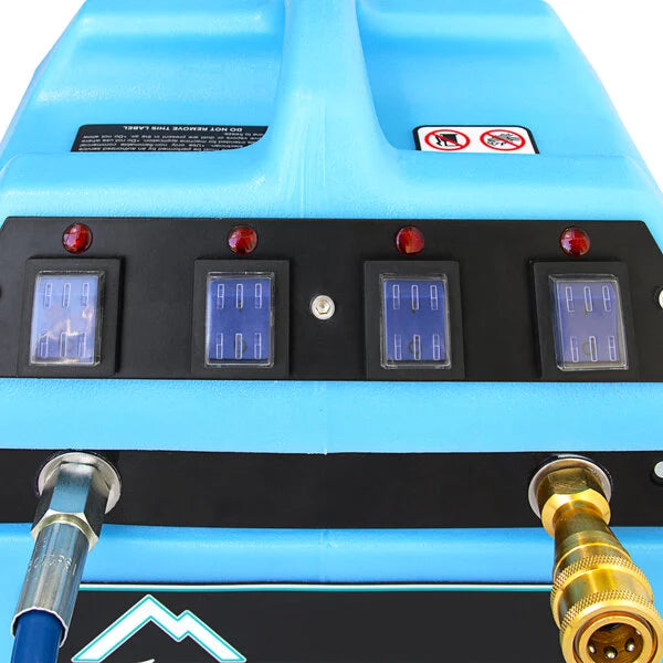 Close-up of Mytee 240-120 Hot Turbo inline heater control panel with four switches and water hose connections.