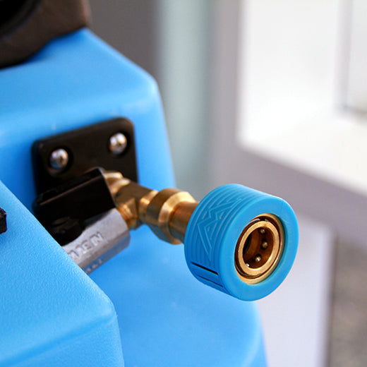 Close-up of Mytee Cuties QD Safety Cover installed on tool showing snug fit on quick disconnect
