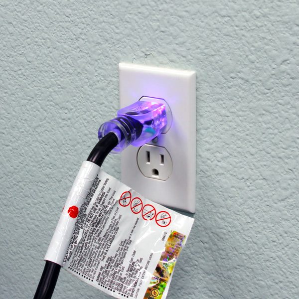Mytee extension cord plugged in with indicator light glowing to show power
