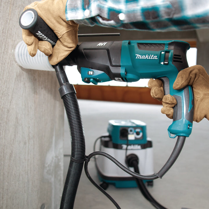 cleaner drilling shown on jobsite using makita dust cup accessory

