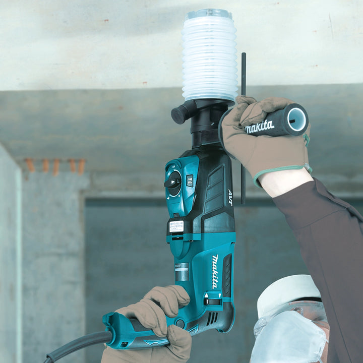 makita dust extraction cup in use on jobsite while drilling overhead
