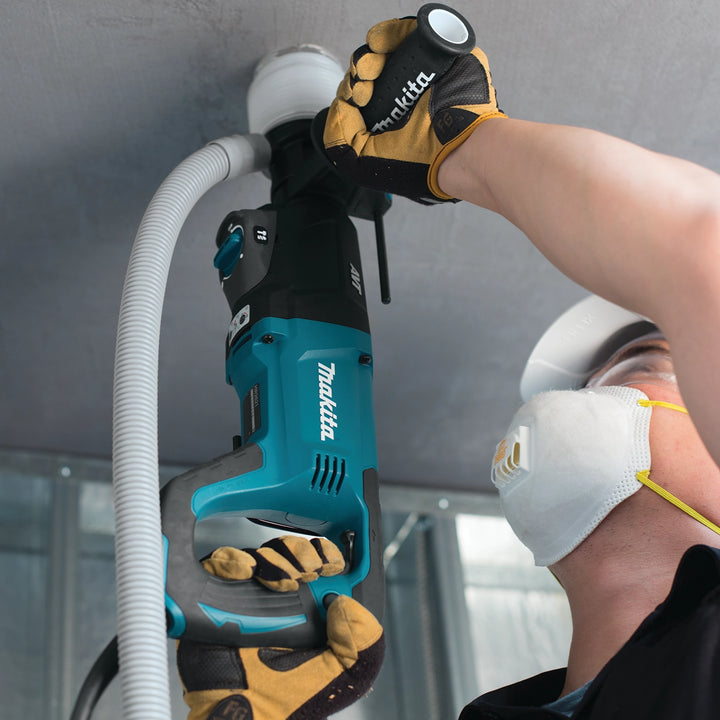 makita dust extraction cup used on ladder during high access drilling
