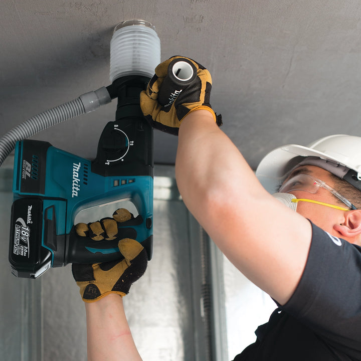 close shot of makita dust cup in action during wall-mounted installation task
