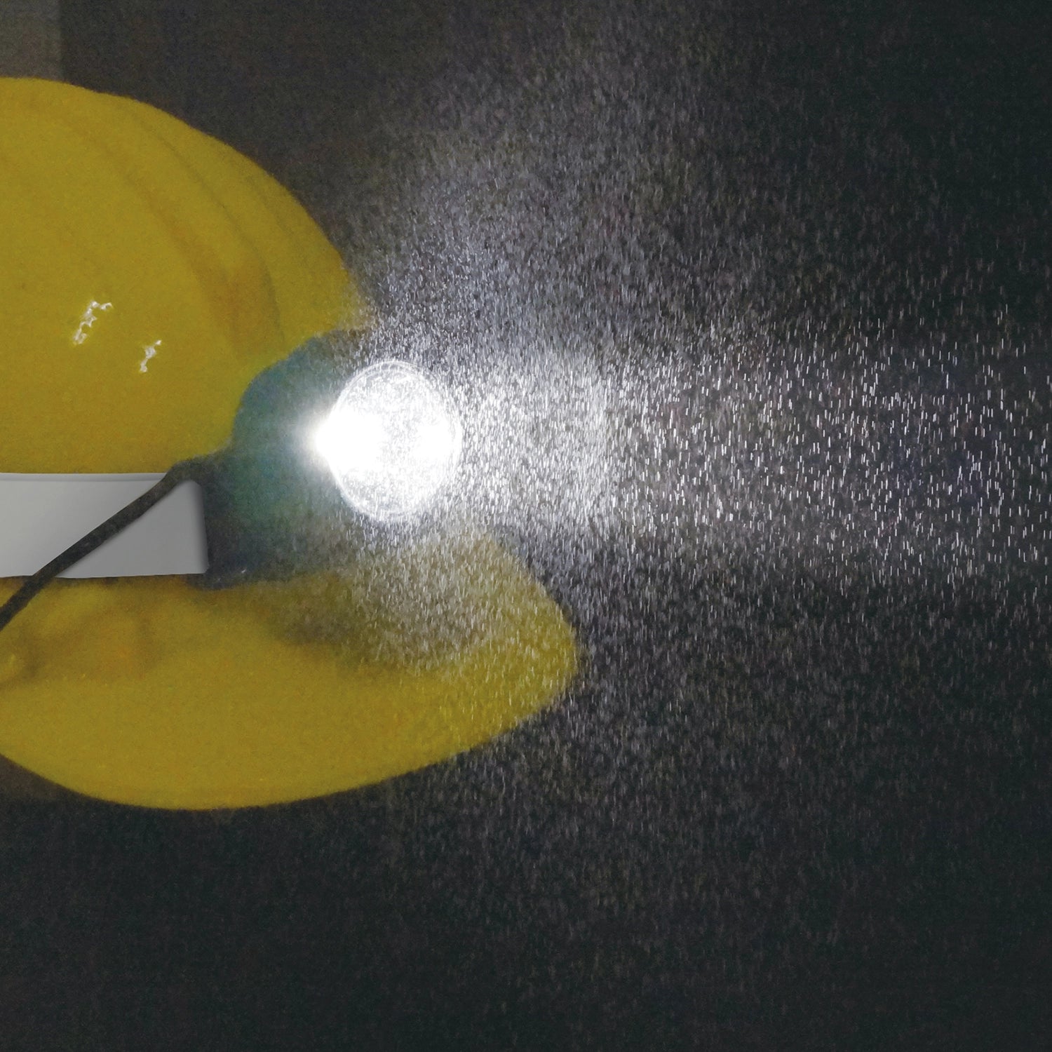 worker using makita led headlamp for visibility in dark job site conditions
