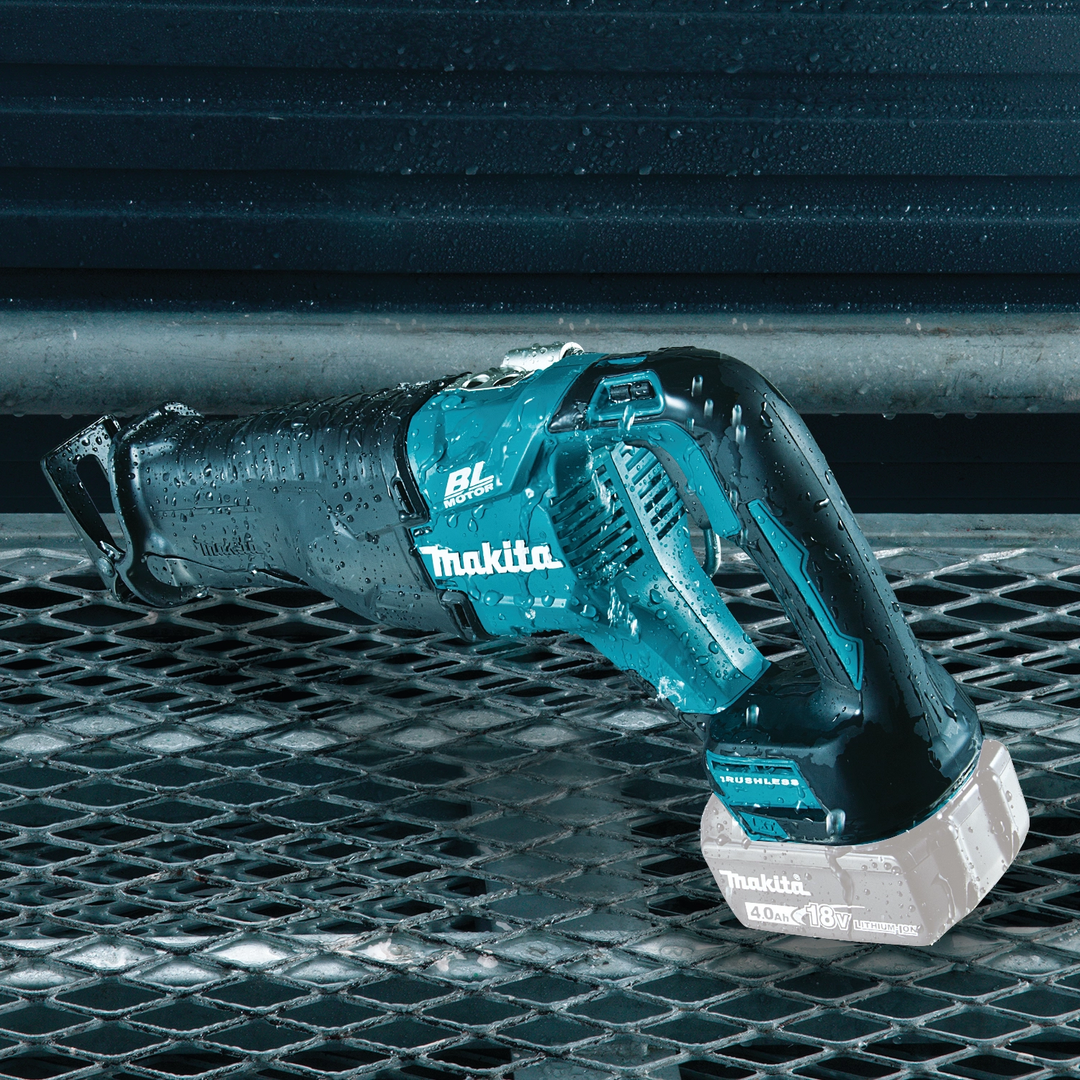 makita 18v lxt reciprocating saw on metal grate during active job
