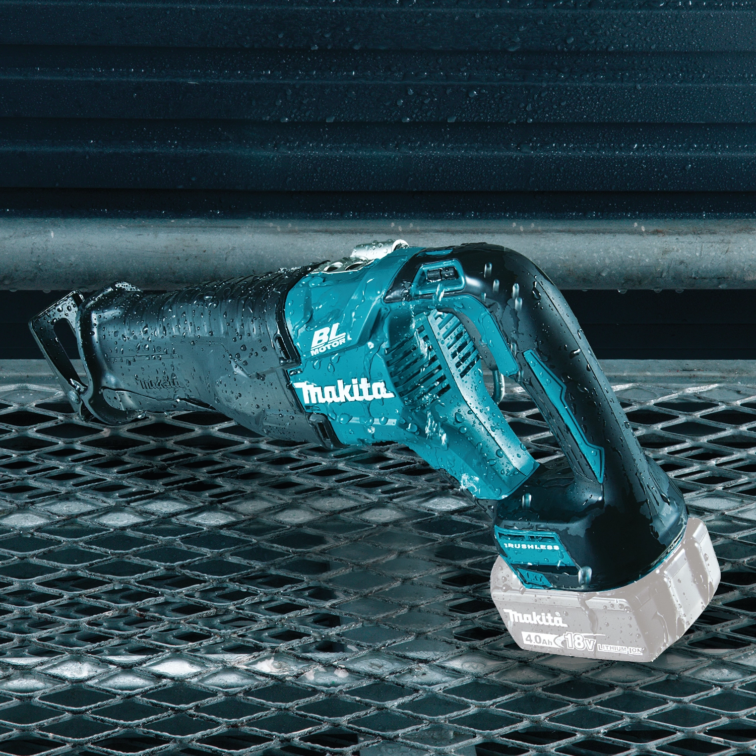 makita 18v lxt reciprocating saw on metal grate during active job
