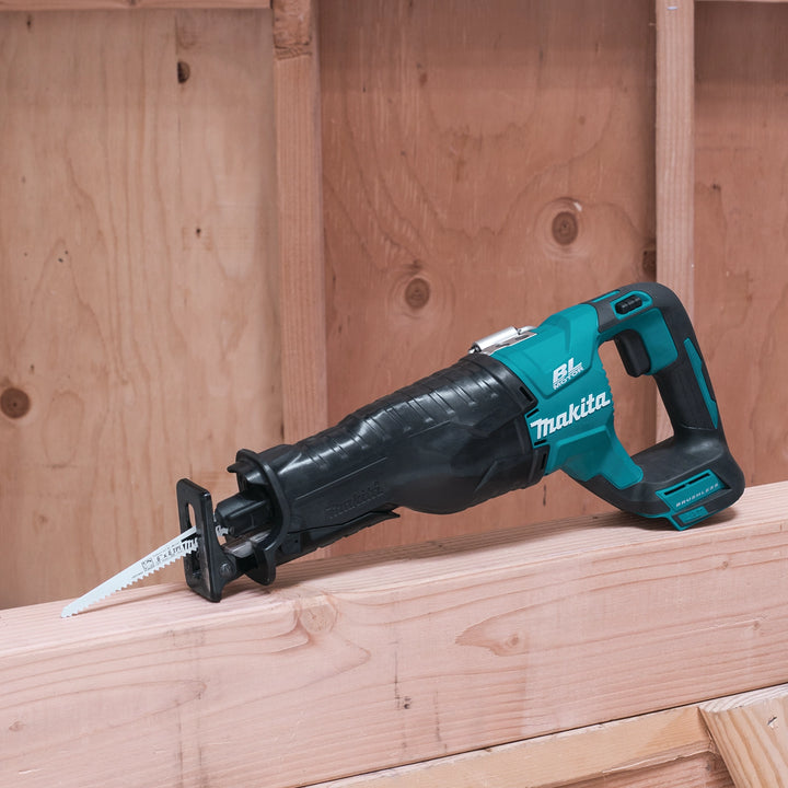makita 18v lxt reciprocating saw positioned at job site with tools
